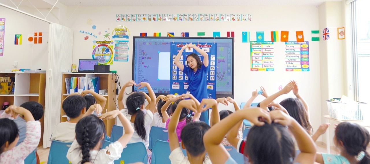 Teacher leads class in activity